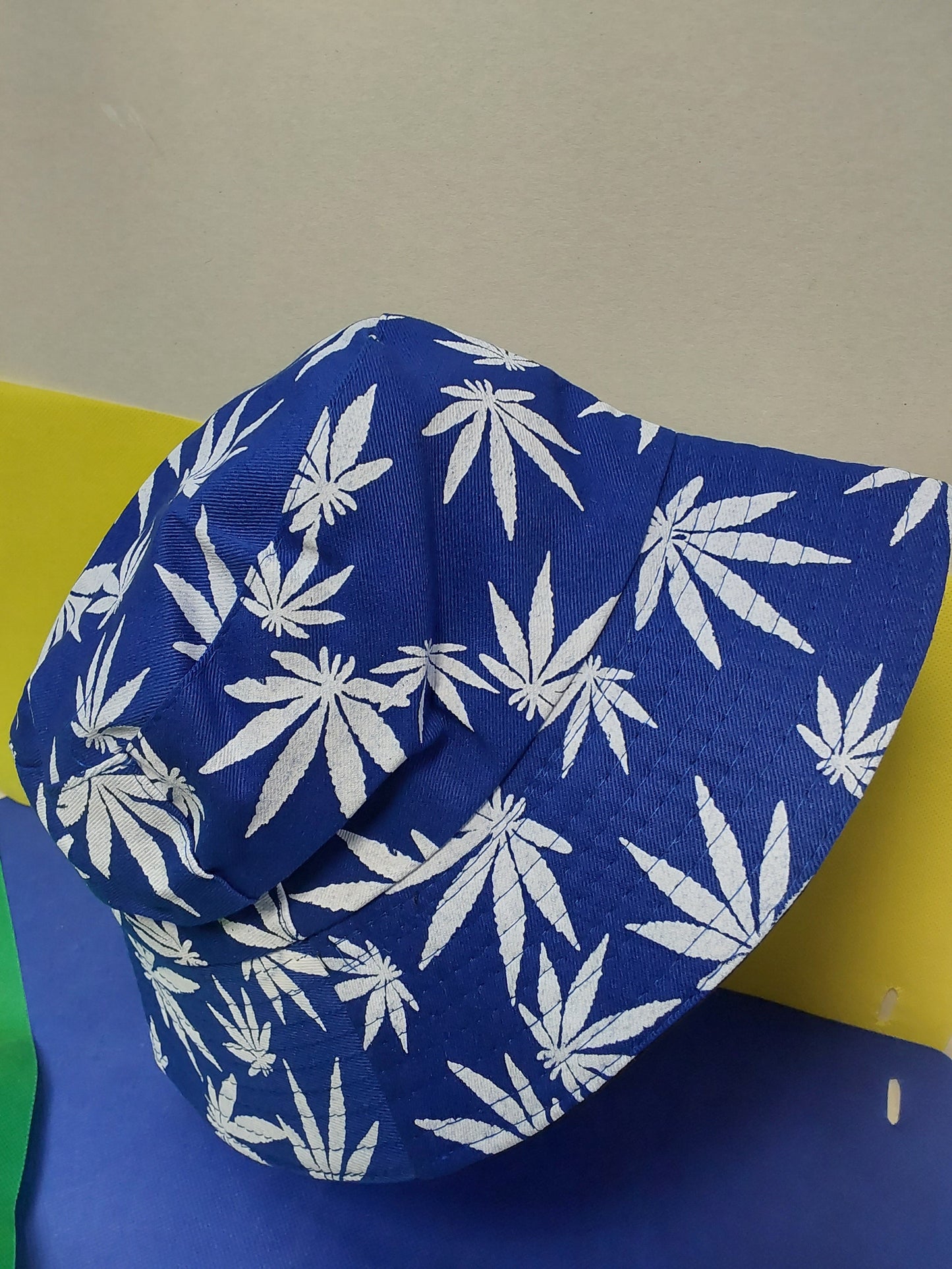 Blue reversible marijuana leaf bucket hat