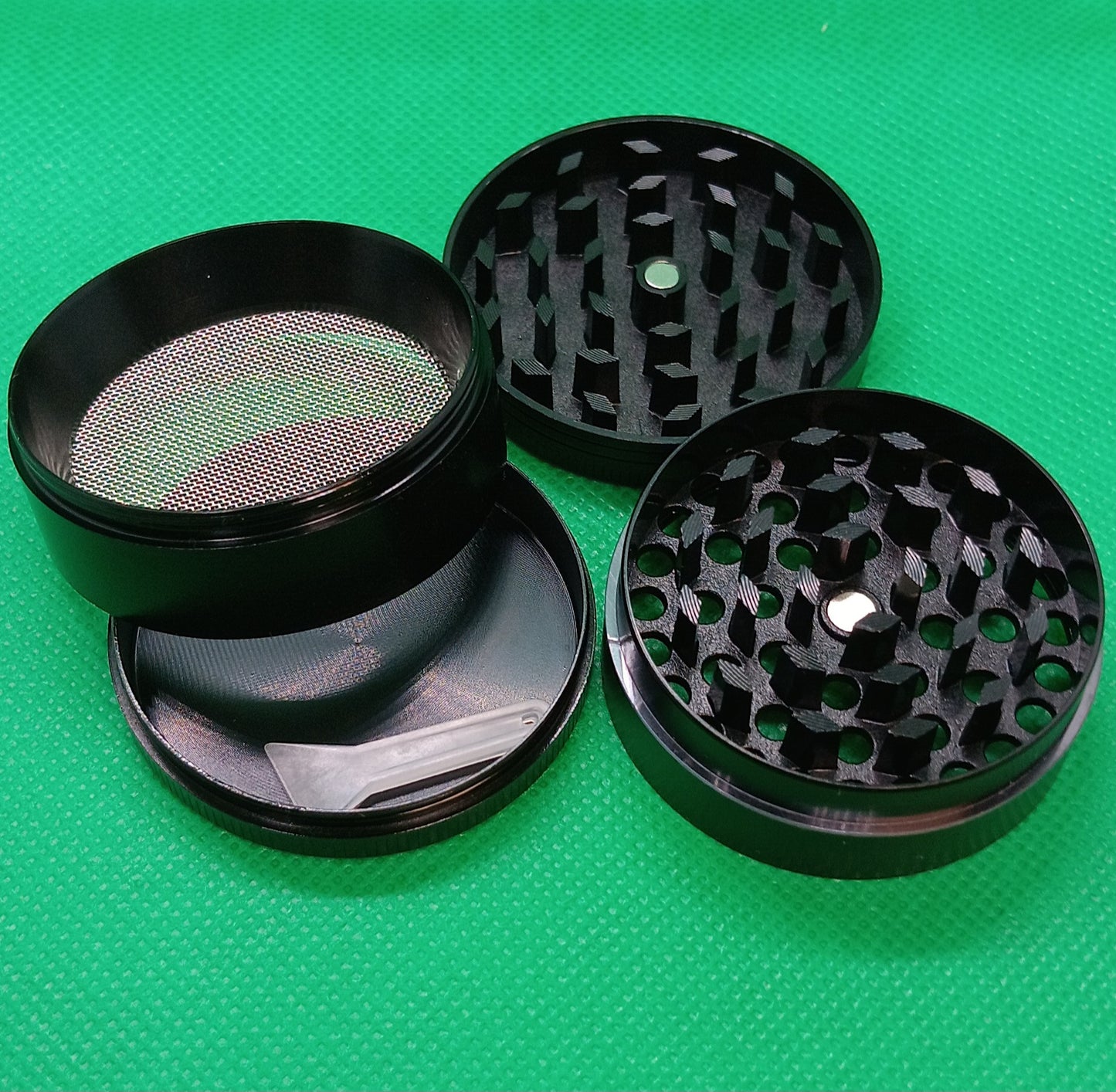 4 pc dripping rasta pot leaf grinder 2"